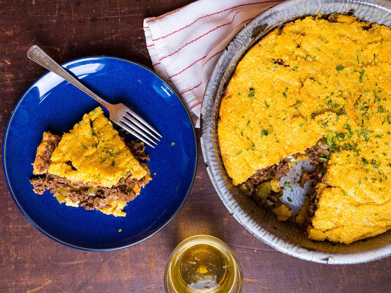 Ground beef and vegetables are spiced with chili powder and cumin under a tender cornmeal crust in this casserole. Get the recipe for <a href="https://www.saveur.com/article/Recipes/Tamale-Pie/">Tamale Pie</a>