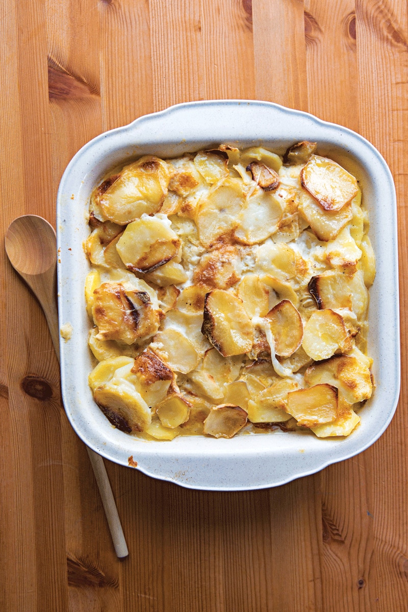 Thinly sliced potatoes and onions are baked in a rich cream sauce in this classic crowd-pleaser. Get the recipe for <a href="https://www.saveur.com/article/recipes/old-fashioned-scalloped-potatoes/">Old-Fashioned Scalloped Potatoes</a>