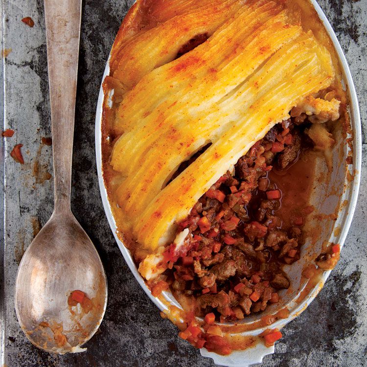 In this pub staple, gravy is added to minced meat, onions, and any vegetables on hand and topped with a buttery mound of mashed potato is dolloped on top. Get the recipe for <a href="https://www.saveur.com/article/Recipes/Classic-Shepherds-Pie/">Shepherd's Pie</a>