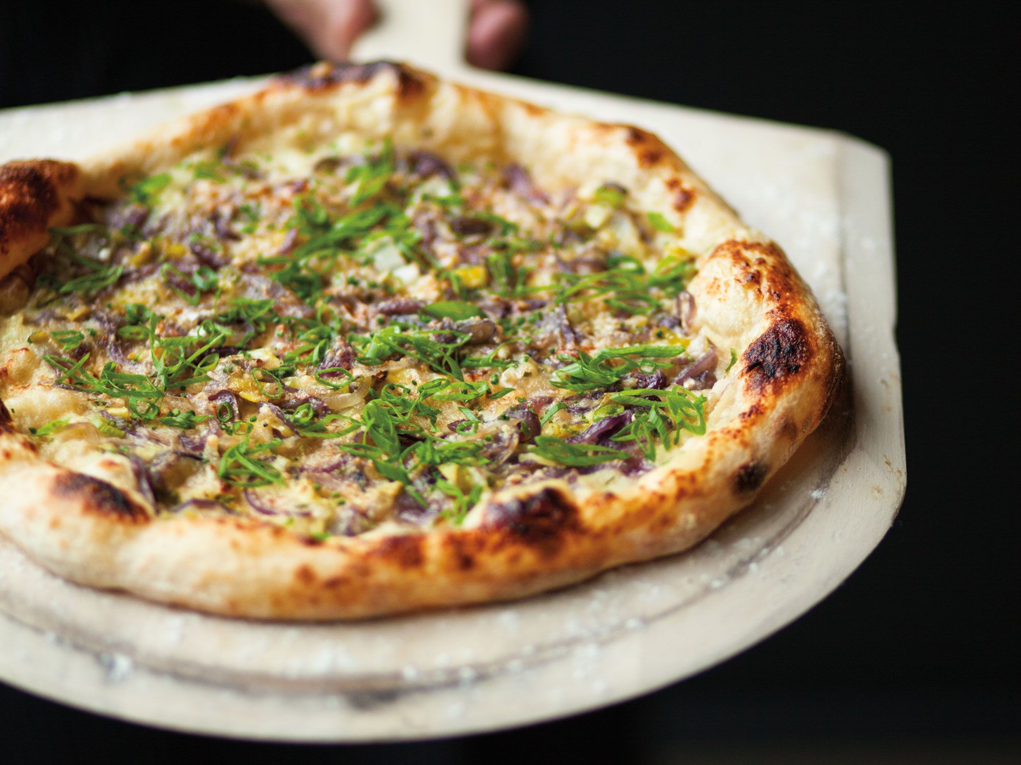The complex layers of flavor formed on this pie showcases the many wonders of onions: From puréed to caramelized to fresh. Get the recipe for <a href="http://www.saveur.com/article/Recipes/Six-Onion-Pizza">Six-Onion Pizza</a>