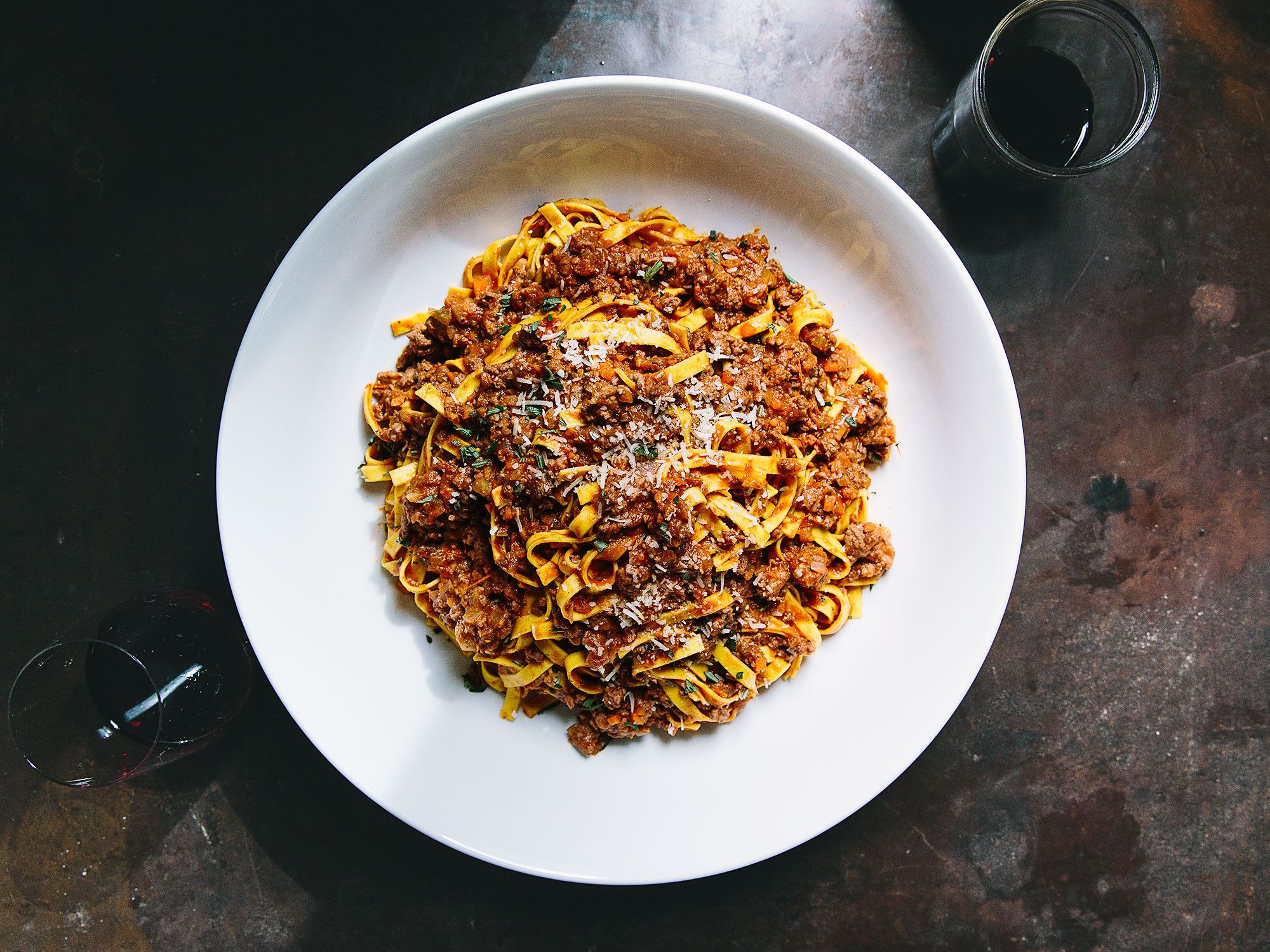 At La Trattoria di Oscar in Bevagna, Italy, chef Filippo Artioli uses a beef and chicken stock to cook the pasta for his robust ragù, made with fat-rich beef belly. Get the recipe for <a href="https://www.saveur.com/article/recipes/tagliatelle-bolognese/">Tagliatelle Bolognese</a>
