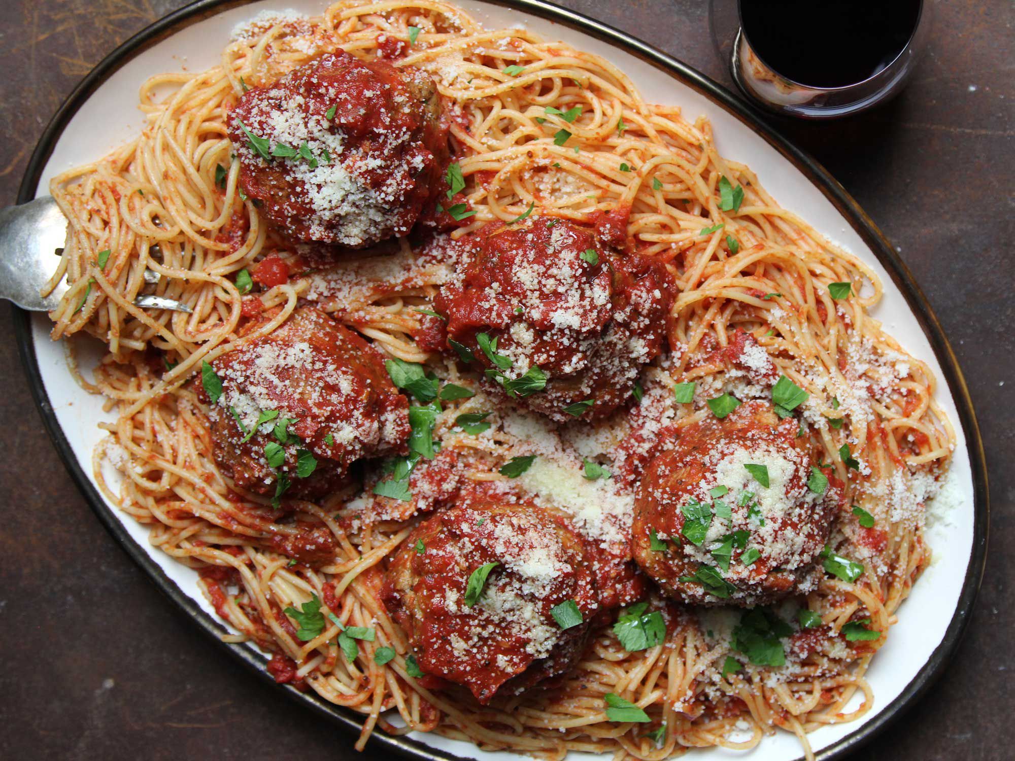 Lou Di Palo shared his grandmother's recipe for the meatballs that he sells at his family's store, Di Palo's Fine Foods, in New York City; they're composed of pork, beef, and veal and flavored with four kinds of cheese. Get the recipe for <a href="http://www.saveur.com/article/Recipes/Di-Palos-Spaghetti-and-Meatballs">Spaghetti and Meatballs</a>