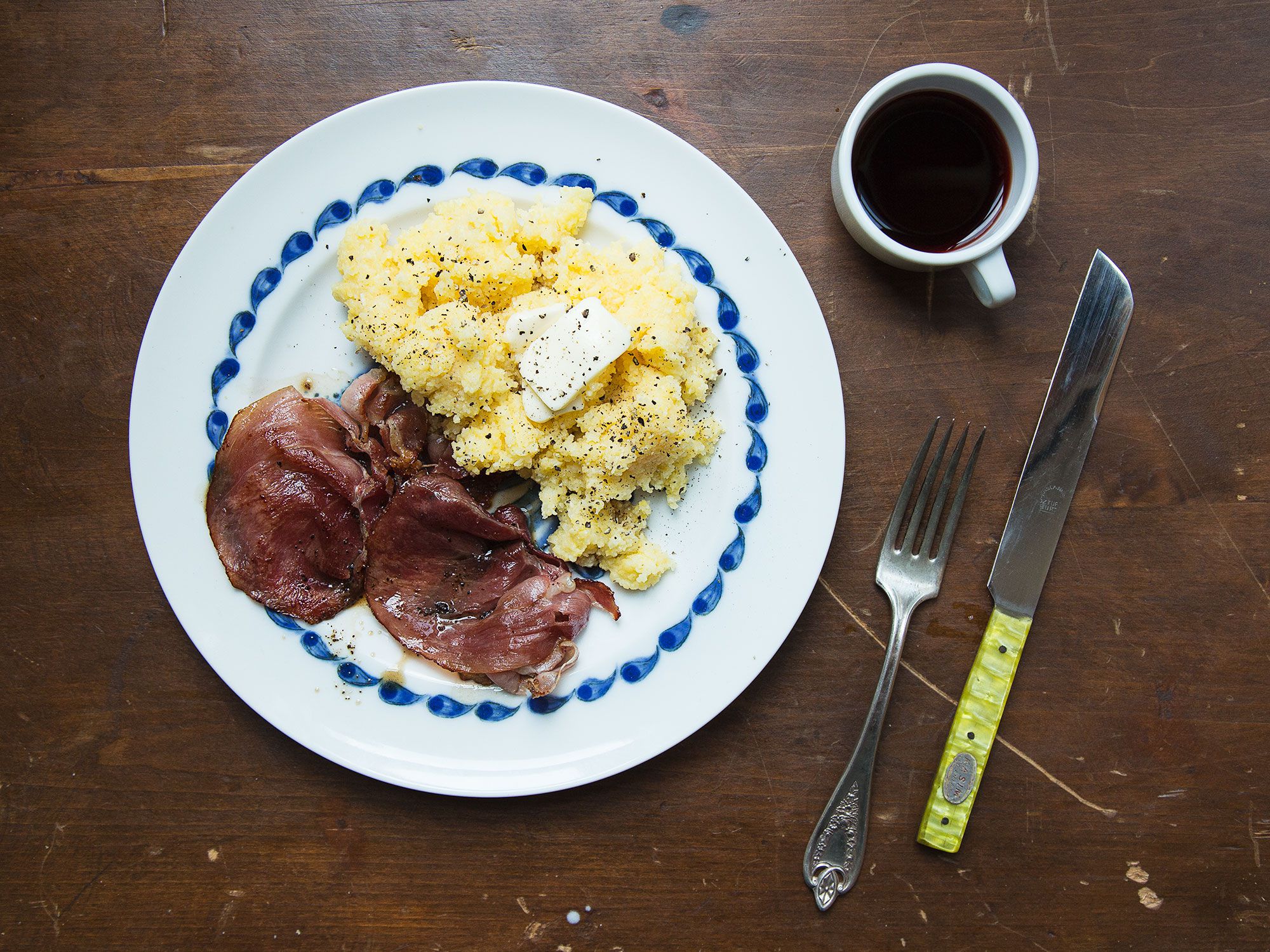 Red-eye gravy, a classic Southern preparation, is a thin sauce made from the drippings of fried country ham and brewed coffee. Get the recipe for <a href="https://www.saveur.com/article/Recipes/Country-Ham-with-Red-Eye-Gravy-and-Grits/">Country Ham with Red-Eye Gravy and Grits</a>