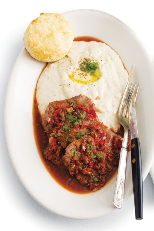 In this recipe, beef medallions are simmered in a Creole-Italian red gravy including enough tomatoes or tomato paste to color and flavor but not dominate the sauce. Get the recipe for <a href="https://www.saveur.com/article/Recipes/Classic-Grillades-Grits/">Grillades and Grits</a></a>