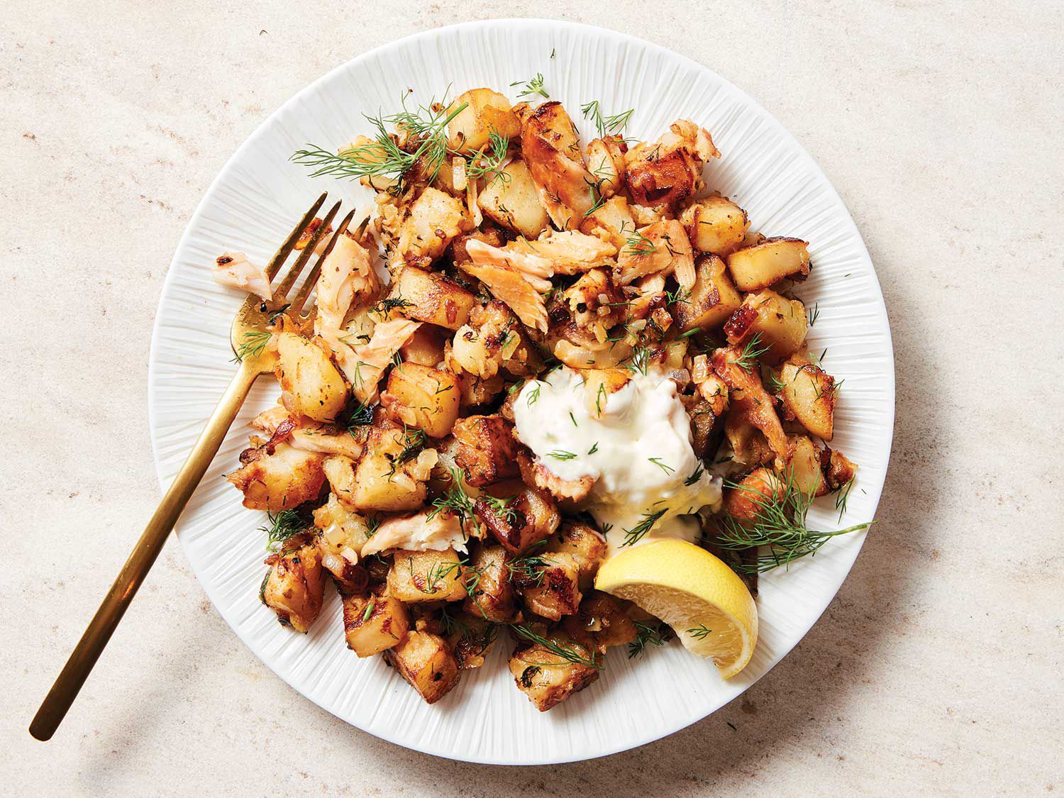 A twist on a breakfast classic, this hash is buttery and luxurious with layers of flavor from caramelized onions, smoky fish, and bright fresh dill. Get the recipe for <a href=”https://www.saveur.com/article/Recipes/Smoked-Trout-Hash-1000064758/”>Smoked Trout Hash</a>
