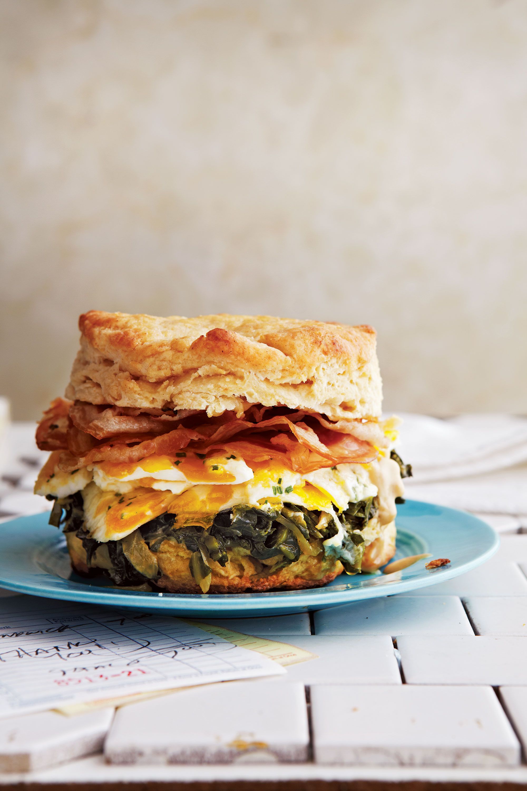Go pancetta-crazy with this breakfast sandwich: eight slices piled atop gorgeously marbleized eggs set on a bed of collard greens cooked in pancetta fat. Get the recipe for <a href="https://www.saveur.com/article/recipes/biscuits-with-pancetta-collard-greens-marbleized-eggs-and-espresso-aioli/">Biscuits with Pancetta, Collard Greens, Marbleized Eggs, and Espresso Aïoli</a>