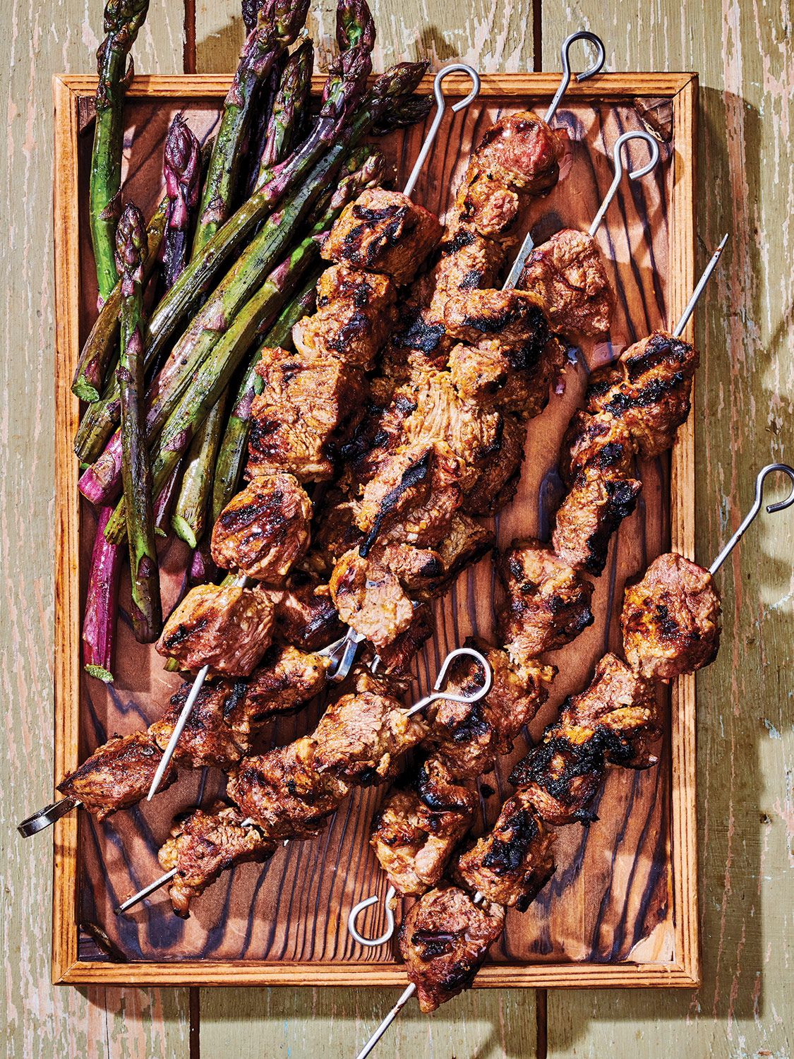 Chunks of lamb shoulder are rubbed with spices and marinated with aromatics before hitting the grill in this easy kebab recipe. Get the recipe for <a href="https://www.saveur.com/grilled-marinated-lamb-kebabs-recipe/">Grilled Marinated Lamb Kebabs</a>