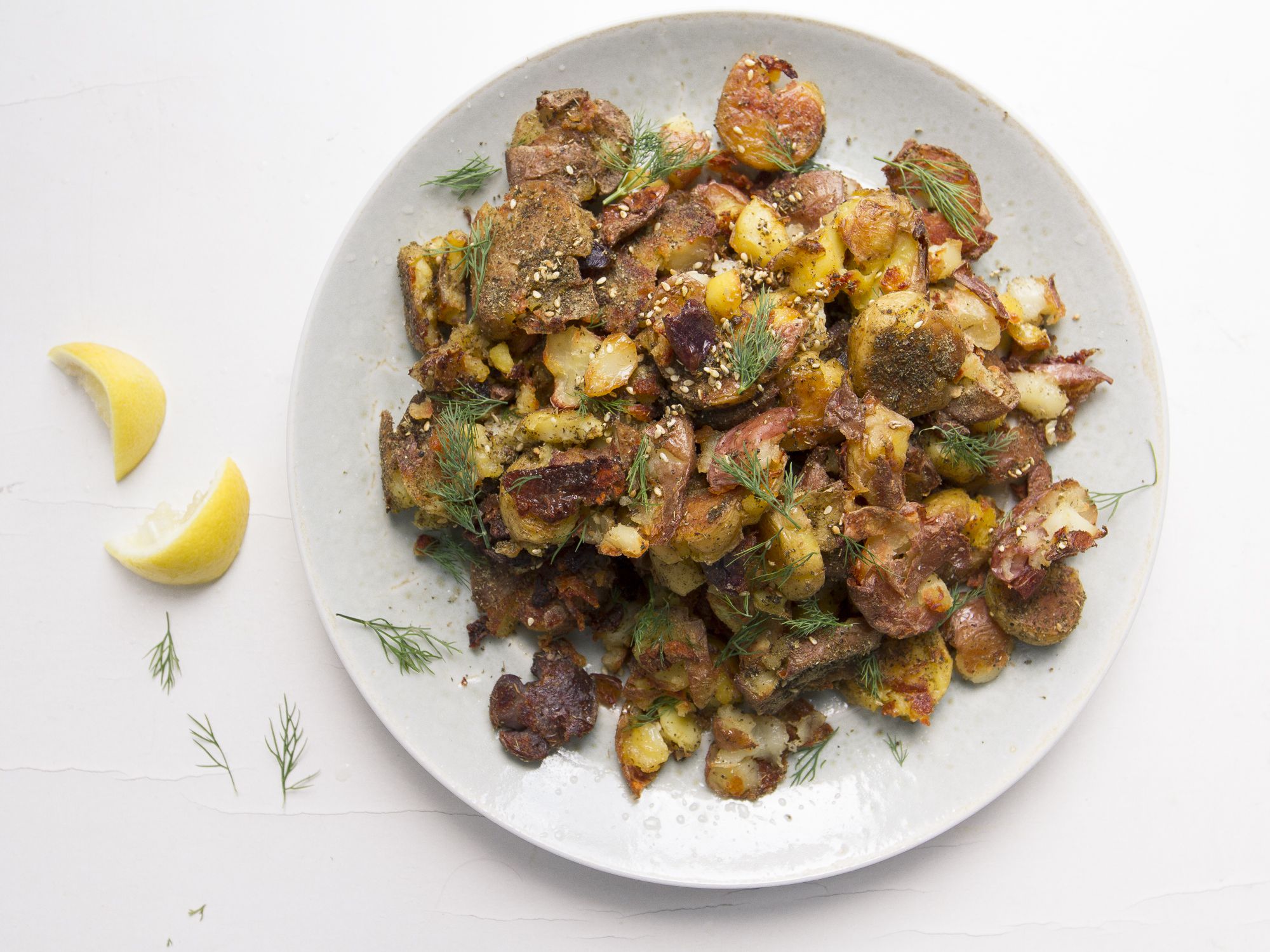 Boiled buttery Yukon gold potatoes are smashed and roasted crisp in this side dish. A finishing sprinkle of za'atar, a heady Middle Eastern mix of spices, seeds, and herbs, brings these potatoes to the next level. Get the recipe for <a href="http://www.saveur.com/crispy-smashed-potatoes-with-zaatar-recipe">Crispy Smashed Za'atar Potatoes</a>