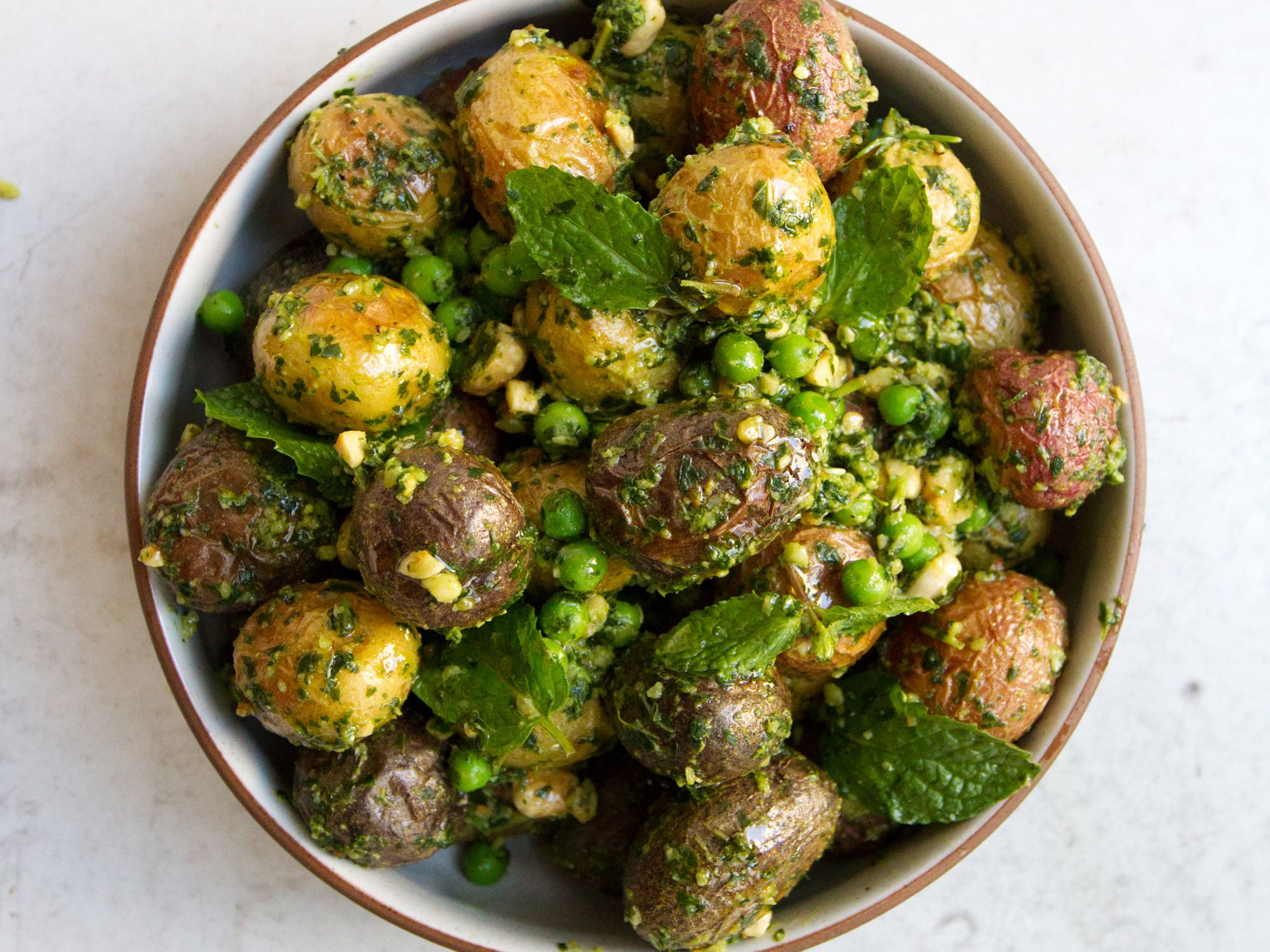 Serve this simple and bright potato salad warm or cold alongside grilled or roasted meats and seafood. Get the recipe for <a href="http://www.saveur.com/article/recipes/pesto-potato-salad">Pesto Potato Salad</a>