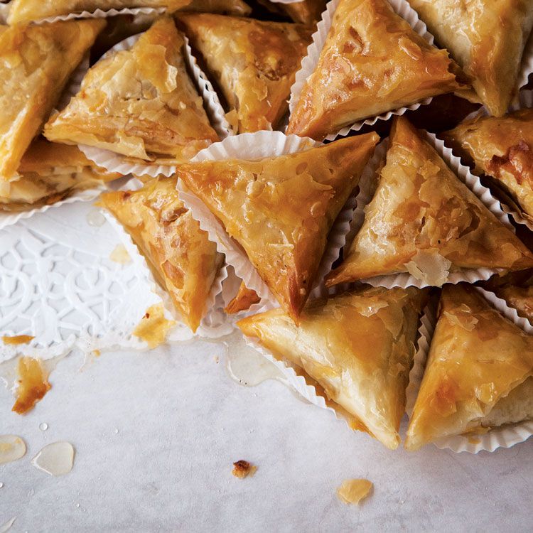 Sticky-sweet almond pastries drenched in a syrup of honey and orange flower water are typical of the rustic desserts of Tunisia. Get the recipe for <a href="https://www.saveur.com/article/Recipes/Fried-Almond-Pastries/">Fried Almond Pastries (Samsa Feuille de Brick )</a>