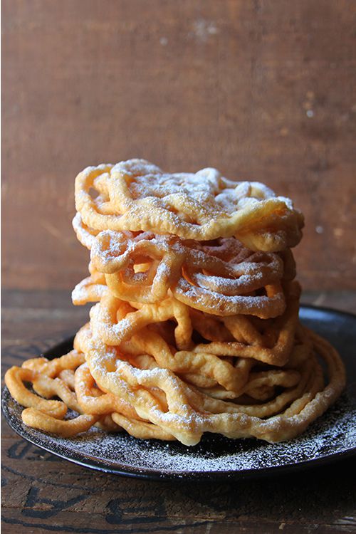 Light and lemony batter is deep fried and dusted with powdered sugar for a sweet May Day treat. Get the recipe for <a href="https://www.saveur.com/article/Recipes/Tippaleipa-Finnish-May-Day-Funnel-Cakes/">Tippaleipä (Finnish May Day Funnel Cakes)</a>