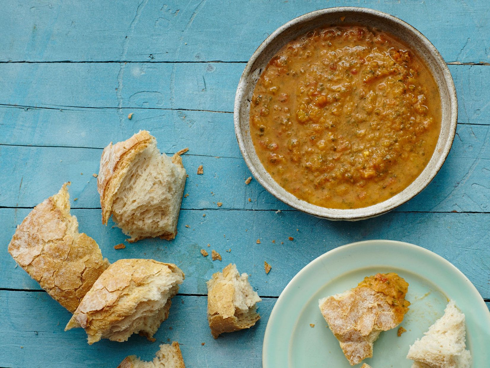Distantly related to Mexican salsa, pebre is an emulsified blend of tomatoes, peppers, and vinegar traditionally served with bread rolls in Santiago. This recipe, from chef Rodolfo Guzmán of Boragó in Santiago, Chile, uses native green <em>ajè cristal</em> chiles, but you can substitute banana peppers to mimic their very mild, floral heat. Get the recipe for <a href="https://www.saveur.com/chilean-pebre-tomato-and-pepper-salsa/">Chilean Tomato and Pepper Sauce (Pebre)</a>