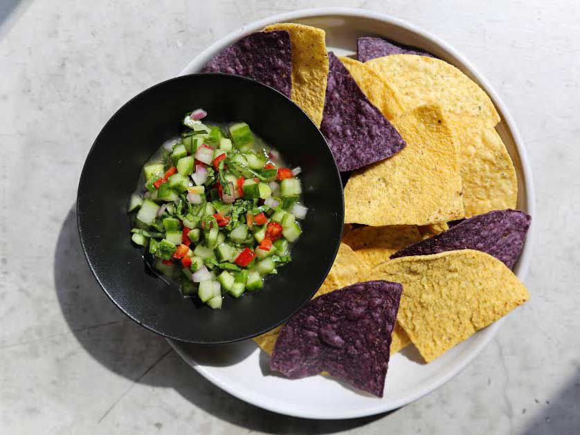 John Karangis, Executive chef at Union Square Events, shared this recipe for a refreshing cucumber salsa. Use a mix of cucumbers for texture and flavor contrast, especially lemon cucumbers and watermelon gherkins if you can find them. Add the herbs no more than 2 hours before serving, and use whichever variety you like, though the lemon balm is especially nice. Get the recipe for <a href="https://www.saveur.com/cucumber-salsa-recipe/">Cucumber Salsa</a>