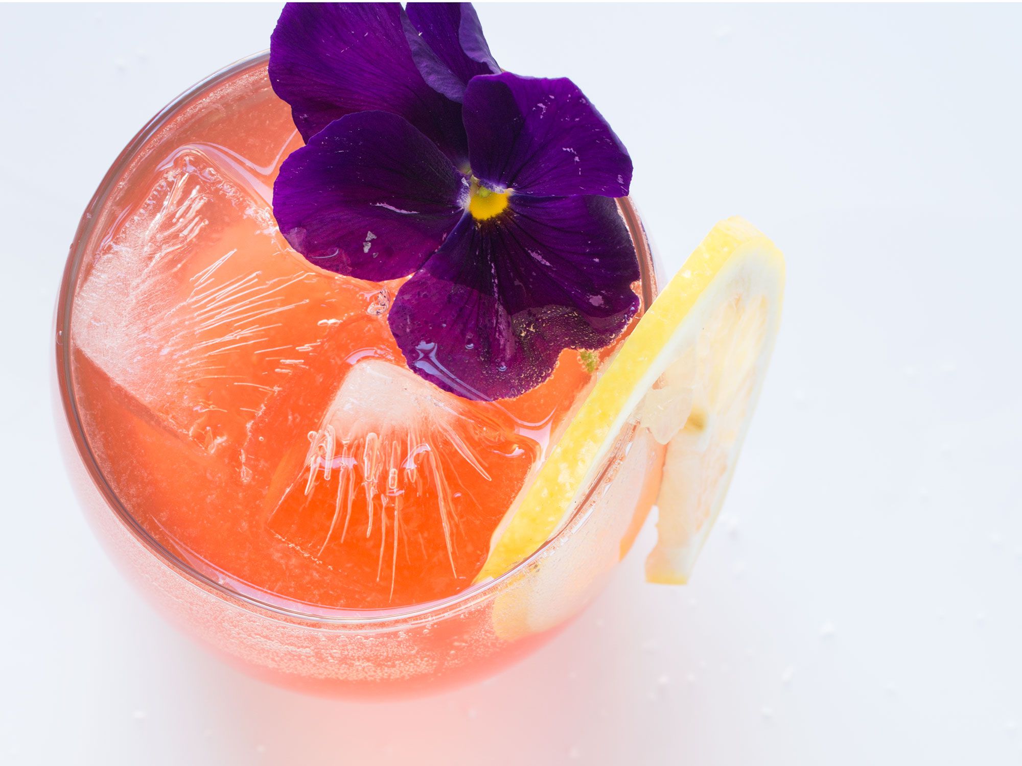 This bright fuchsia aperitivo mixes tannic hibiscus tea, sweet Lillet Rosé, and dry rosé with a hit of prosecco. Get the recipe for <a href="http://www.saveur.com/everythings-rose-cocktail-recipe">Everything's Coming Up Rosé</a>