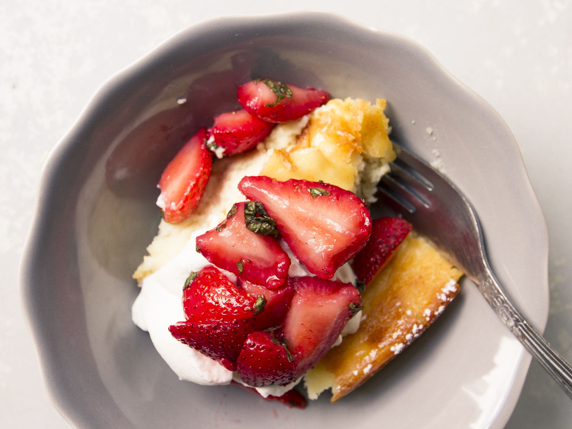 Ground almonds add body and flavor to this creamy Swedish cheesecake, topped with clouds of whipped cream and ripe strawberries macerated with fresh mint. Get the recipe for <a href="https://www.saveur.com/article/recipes/ostkaka-med-farska-jordgubbar-och-mynta-almond-cheesecake-with-macerated-strawberries-and-mint/">Almond Cheesecake with Macerated Strawberries and Mint</a>