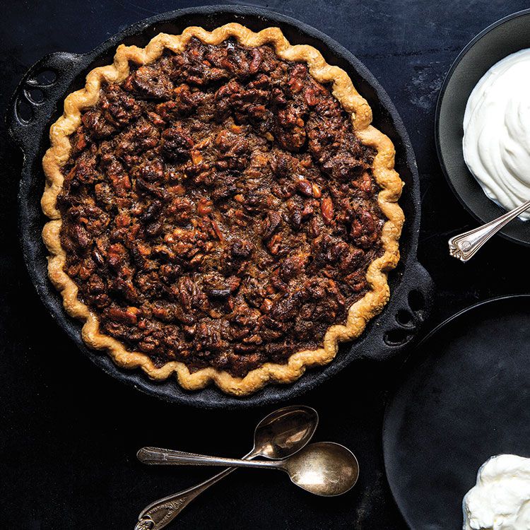 Browned butter accentuates the flavor of earthy walnuts and a sour cream topping offsets the richness of the filling for a balanced, delectable dessert. Get the recipe for <a href="https://www.saveur.com/article/recipes/brown-butter-walnut-pie-with-sour-whipped-cream/">Brown Butter Walnut Pie with Sour Whipped Cream</a>