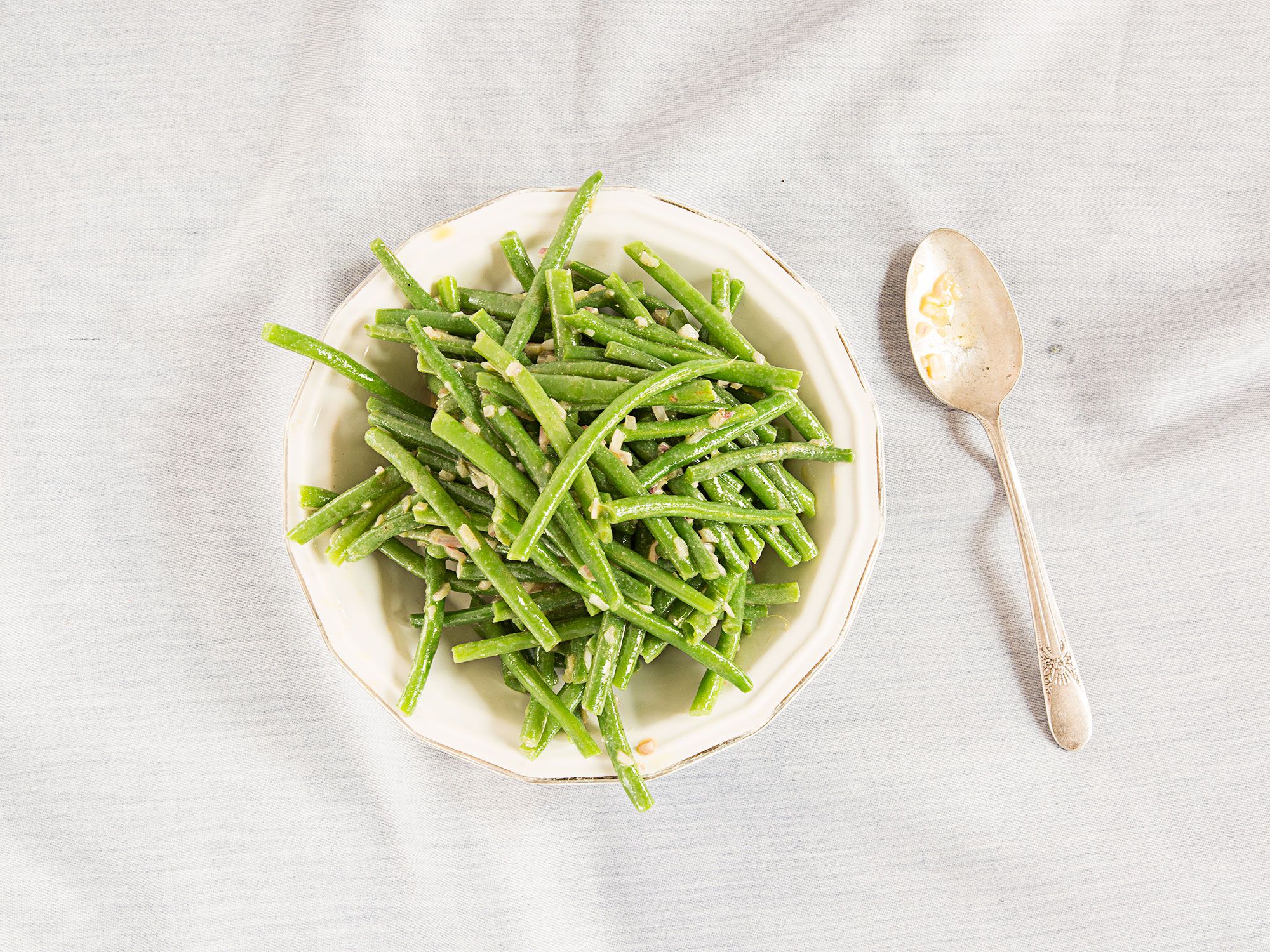 This dish of crisp <em>haricots verts</em> paired with a quick Dijon vinaigrette makes a simple, easy-to-transport side that's great for picnics or summer barbecues. Get the recipe for <a href="https://www.saveur.com/haricot-verts-dijon-vinaigrette-recipe/">Haricots Verts with Dijon Vinaigrette</a>