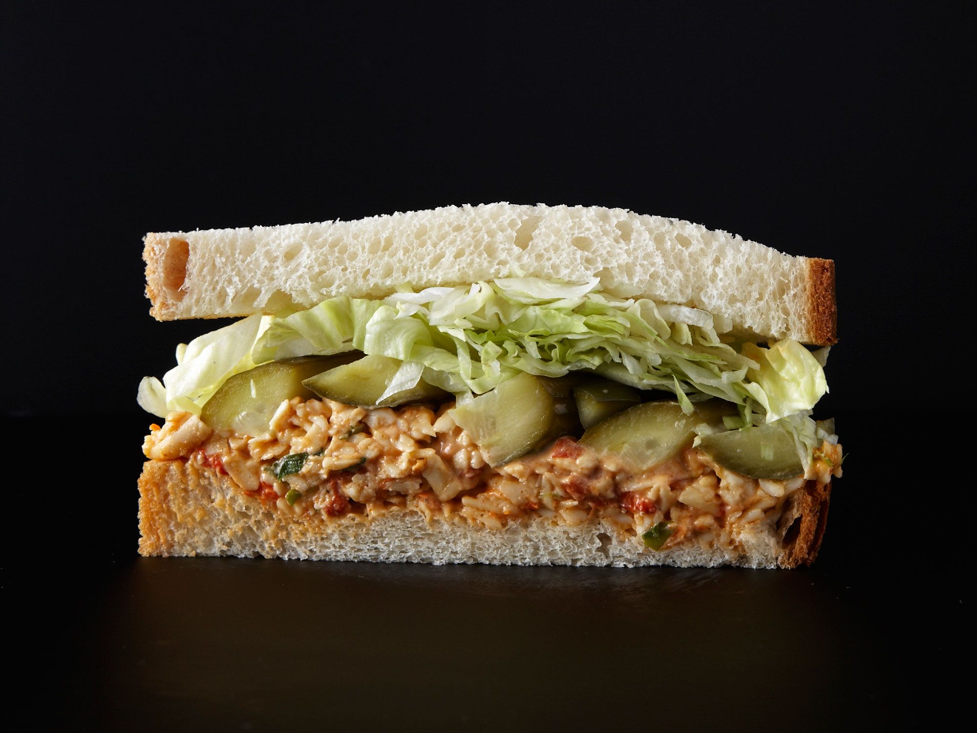 This classic pimento cheese sandwich is spiced up with Sriracha, and comes from Brandon Martinez of Noble Sandwich Co. in Austin, Texas. Get the recipe for <a href="https://www.saveur.com/article/recipes/pimento-cheese-sandwich-with-homemade-pickles/">Pimento Cheese Sandwich with Homemade Pickles</a>