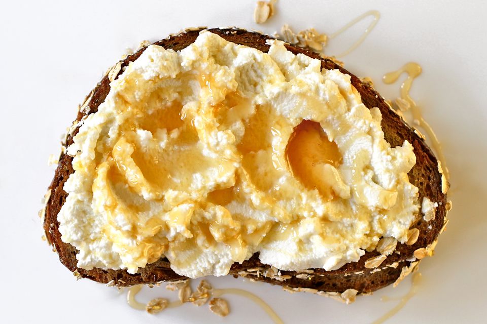 A dollop of ricotta on earthy-sweet oat bread is delicious; add a drizzle of sourwood honey and it's elevated to the exquisite. (For a bit of sophisticated heat, top with a sprinkle of freshly-crushed red pepper flakes.) Get the recipe for <a href="https://www.saveur.com/article/Recipes/Ricotta-and-Honey-Sandwich/">Ricotta and Honey Sandwich</a>