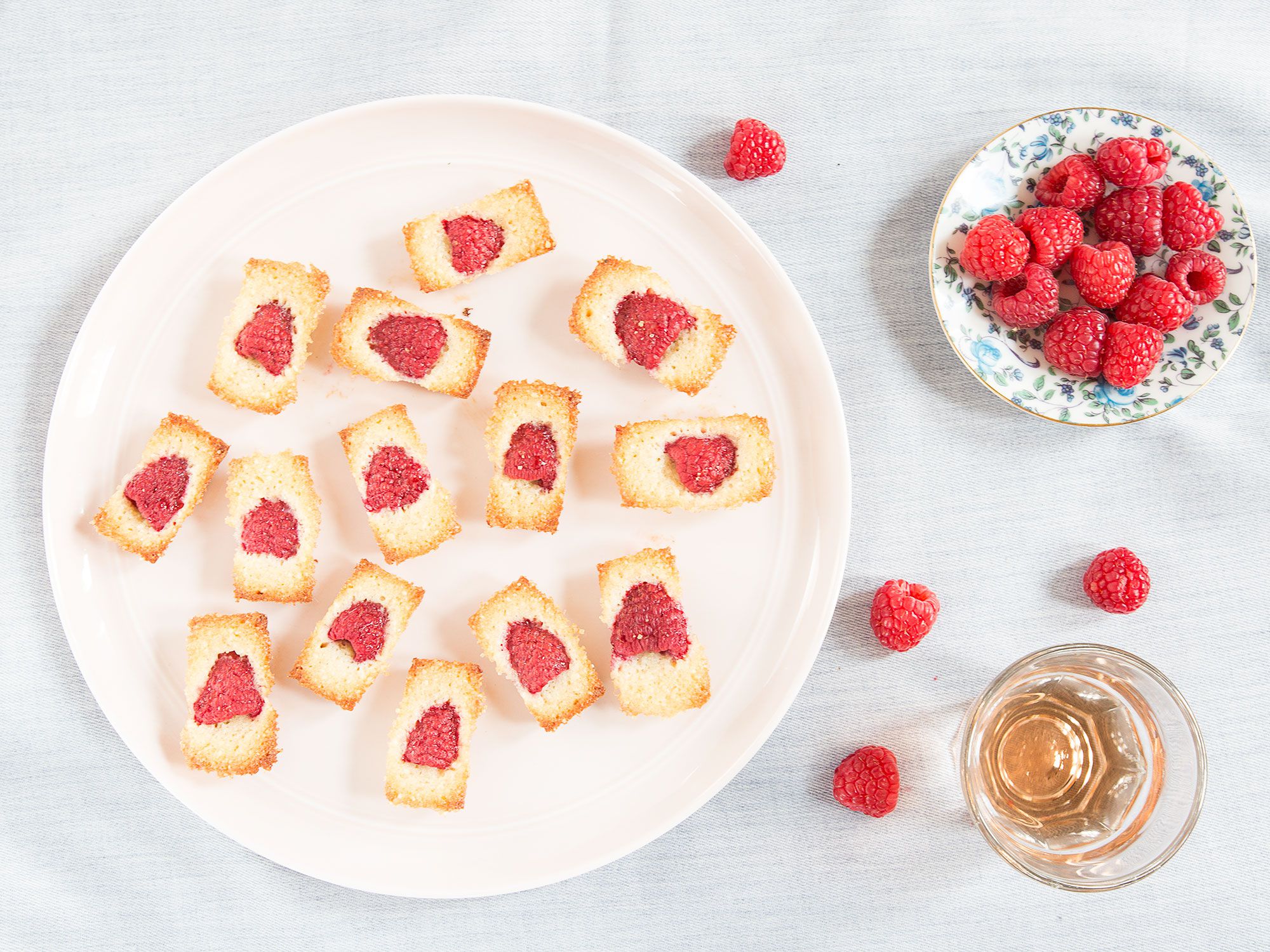 These mini financiers make perfect portable treats for summer get-togethers. They're best eaten the day they're made, but if you want to start them ahead of time, you can make the batter the day before, refrigerate it overnight, and bake them in the morning. Get the recipe for <a href="https://www.saveur.com/raspberry-financiers-recipe/">Raspberry Financiers</a>