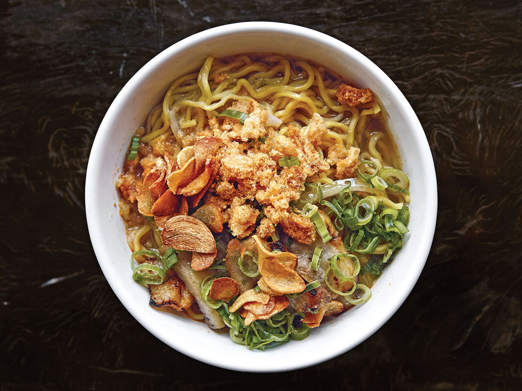 A regional soup packed with egg noodles and pig parts, La Paz batchoy was born in the La Paz district of Iloilo city, in the province where chef Dale Talde's mother was born. Talde's version streamlines the traditional recipe, keeps the liver and intestines optional, and applies just enough shrimp paste to keep things funky. Get the recipe for <a href="https://www.saveur.com/filipino-pork-noodle-soup-recipe/">Pork Noodle Soup with Shrimp Paste (La Paz Batchoy)</a>
