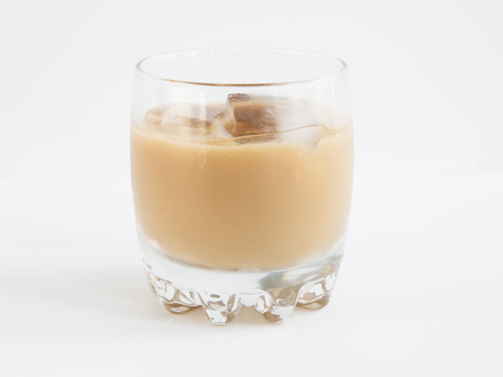 The name of this cocktail—a cross between a White Russian and a Thai iced coffee—is a joking nod to John Goodman's character in the film the Big Lebowski. Get the recipe for <a href="https://www.saveur.com/sabbath-white-russian-coffee-cocktail-recipe/">The Sabbath</a>