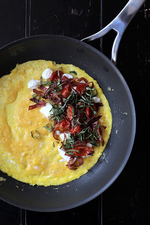 Roasting cherry tomatoes in an oven brings out their natural sweetness; salty salami is a perfect counterpoint. Get the recipe for <a href="https://www.saveur.com/article/Recipes/Salami-Tomato-Mozzarella-and-Basil-Omelette/">Salami, Oven-Roasted Tomato, Mozzarella, and Basil Omelette</a>