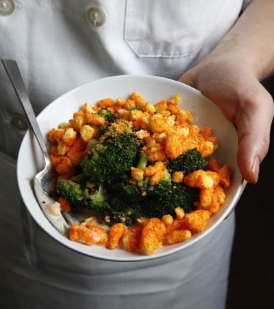 A bed of funky cheese sauce hosts a pile of tender greens, showered by that addictively crunchy, cheesy snack. Broccoli cheese casserole never had it so good. Get the recipe for <a href="https://www.saveur.com/article/Recipes/Saveur-100-2011-Broccoli-with-Cheetos/">Broccoli with Cheetos</a>