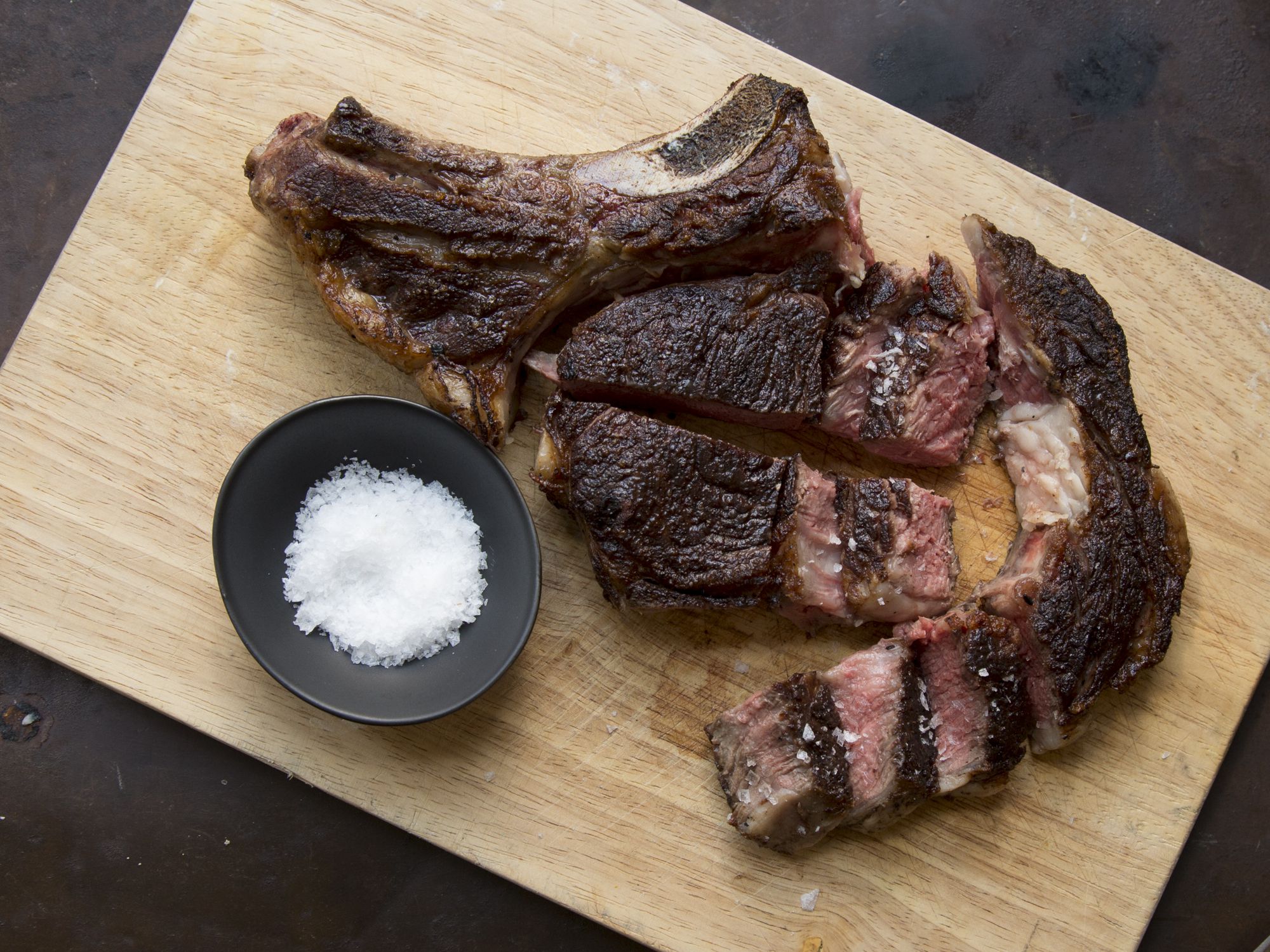 Chef José Andrés likes to season his steak <em>after</em> it cooks, claiming that this helps to accentuate the flavor of meat, and particularly this slow-grilled, smoky rib eye. Get the recipe for <a href="http://www.saveur.com/grilled-bone-rib-eye-recipe">Grilled Bone-In Rib Eye</a>