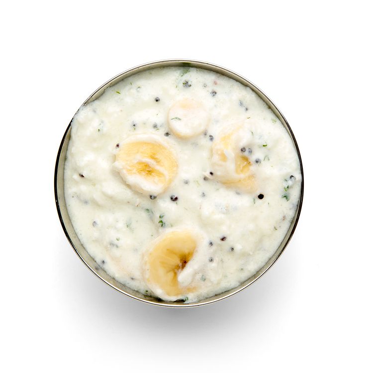 At the Indian table, a variety of yogurt-based raitas mollify the tongue-searing effect of chiles. This version, made fruity and sweet with the addition of coconut and banana, is adapted from <em>Foods of the World: The Cooking of India (Time Life, 1969)</em>. Get the recipe for <a href="https://www.saveur.com/article/recipes/kela-ka-raita-yogurt-with-banana-and-grated-coconut/">Kela ka Raita (Yogurt with Banana and Grated Coconut)</a>
