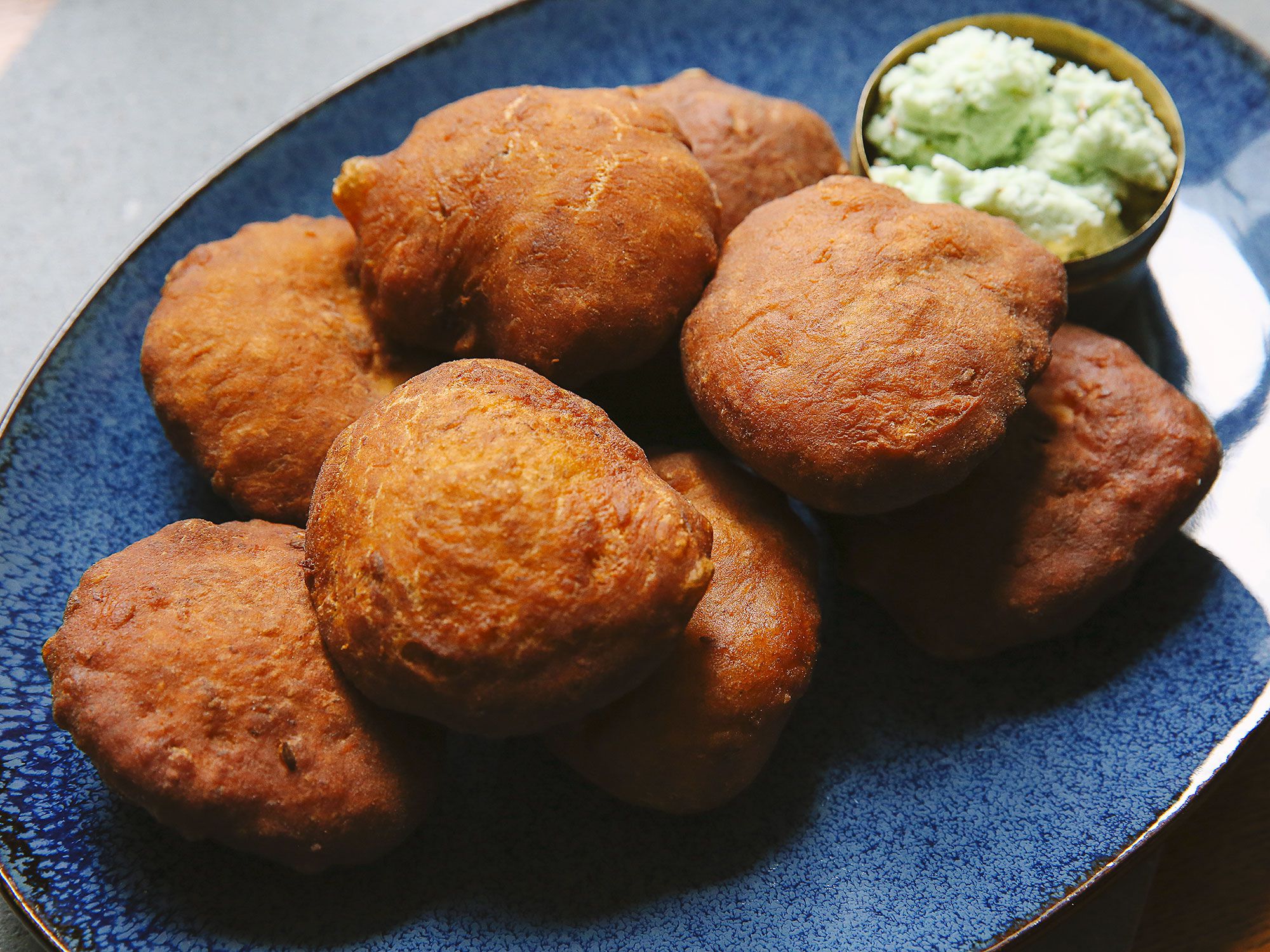 Sweet and spicy pancakey doughnuts made with bananas and cumin. Get the recipe for <a href="https://www.saveur.com/mangalore-buns-banana-puri-recipe/">Indian Fried Banana Cakes (Mangalore Buns)</a>