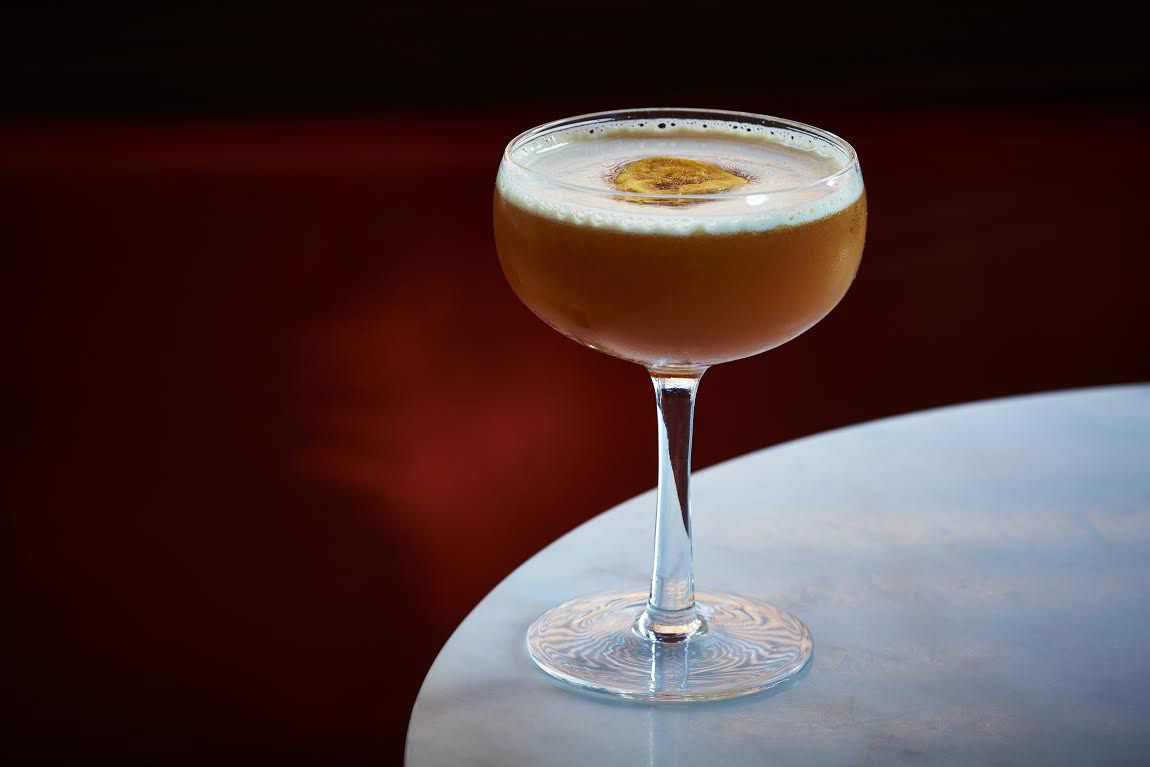 This sophisticated cocktail is made with Giffard Crème de Banane du Brezil, a banana liqueur made from macerated bananas, it combines two types of rum and a homemade banana syrup to make a deeply flavored drink that's not too sweet. Get the recipe for <a href="https://www.saveur.com/article/recipes/banana-rum-cocktail/">No Bananas Today</a>