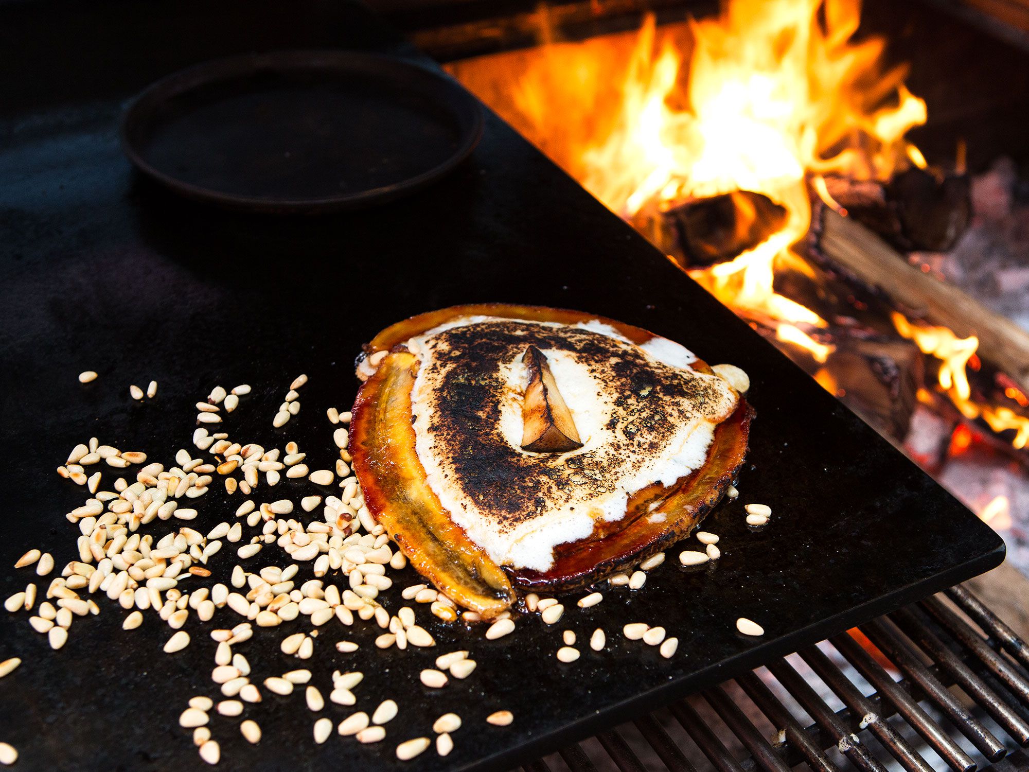 A thick yet fluffy pancake full of creamy bananas, smooth hints of pear, and crunchy pine nuts over a heap of cool crème fraîche. "This is good with any ripe banana," Mallmann says, so if you have extra-sweet varieties besides the ubiquitous Cavendish available, use them. Get the recipe for <a href="http://www.saveur.com/banana-pear-pancake-recipe">Grilled Banana-Pear Pancake</a>