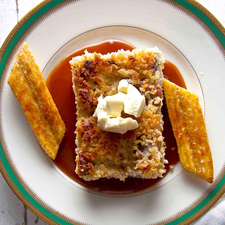This decadent take on an iconic dessert, from Mat & Naddie's Restaurant in New Orleans, Louisiana, gilds the lily, pan-frying white chocolate-enriched bread pudding, and plating it with satiny caramel and sweet bananas. Get the recipe for <a href="https://www.saveur.com/article/Recipes/White-Chocolate-Bread-Pudding/">White Chocolate Bread Pudding with Bananas and Rum Sauce</a>