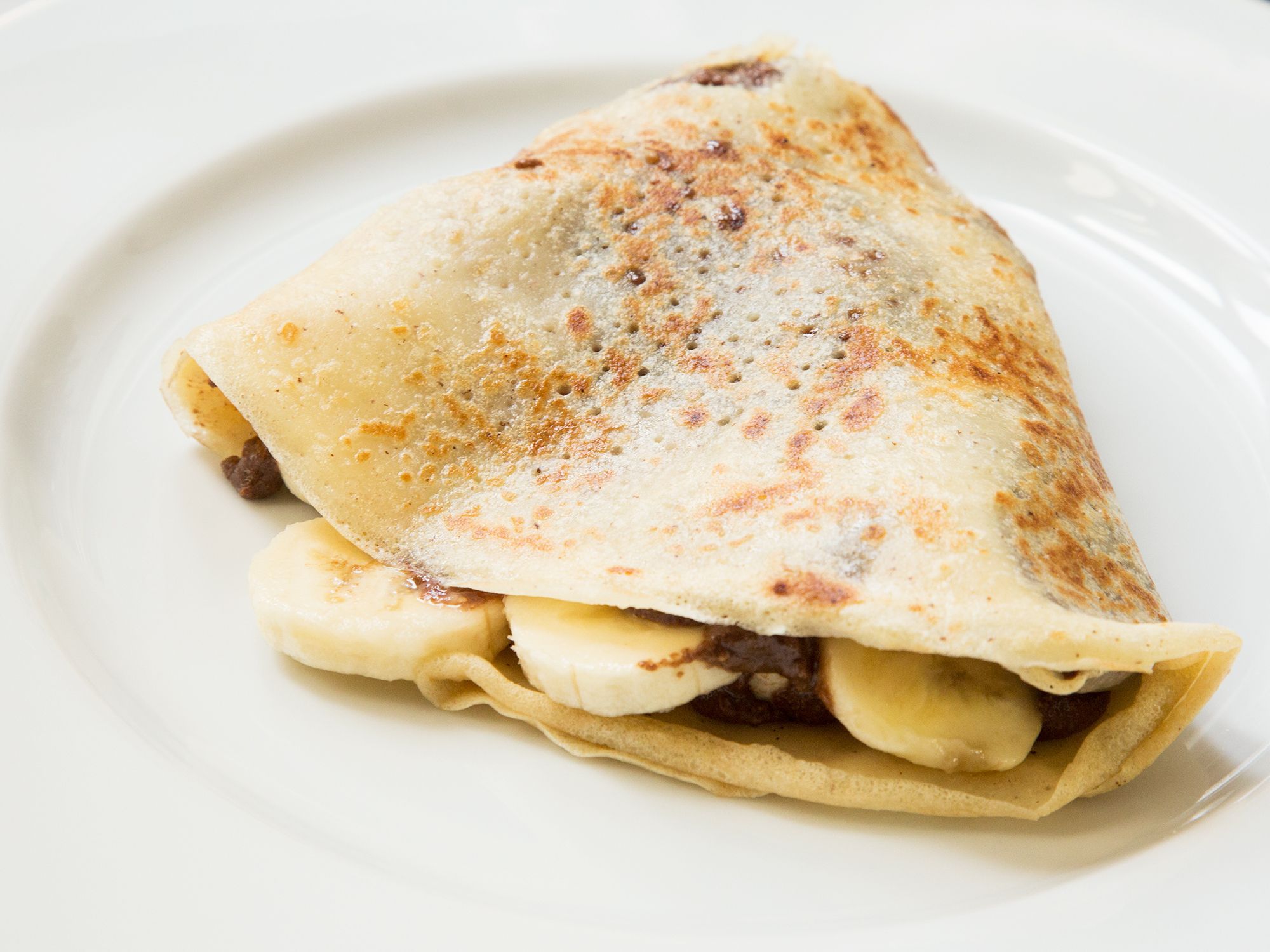 Bananas are already a provocative fruit. Adding nutella on a warm crêpe just makes the romantic night even better. Get the recipe for <a href="https://www.saveur.com/chocolate-hazelnut-and-banana-crepes-recipe/">Chocolate-Hazelnuts and Banana Crêpes</a>