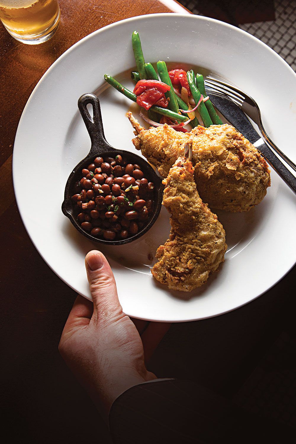 Double-fried chicken marinated in an aromatic brine is a specialty of the house at the restaurant Rye KC in Leawood, Kansas. Get the recipe for <a href="https://www.saveur.com/article/Recipes/Extra-Crispy-Fried-Chicken/">Extra-Crispy Fried Chicken</a>