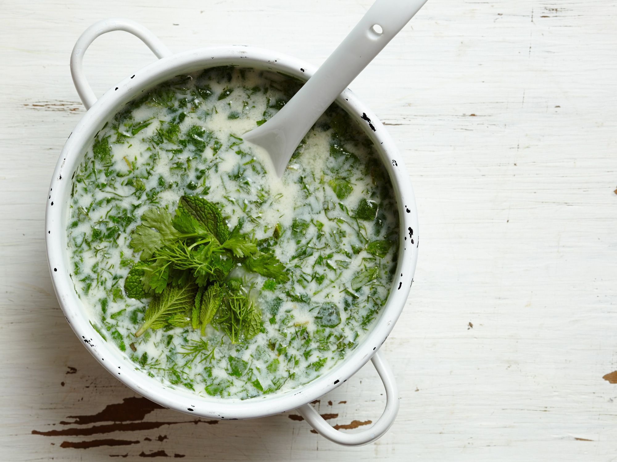 Rice and garbanzos add body to this vegetarian soup laced with fresh greens and herbs. Serve it chilled—as we have done—or, if you prefer, just slightly warmed. Get the recipe for <a href="http://www.saveur.com/cold-yogurt-soup-with-herbs-and-chickpeas-recipe">Cold Yogurt and Herb Soup with Chickpeas</a>