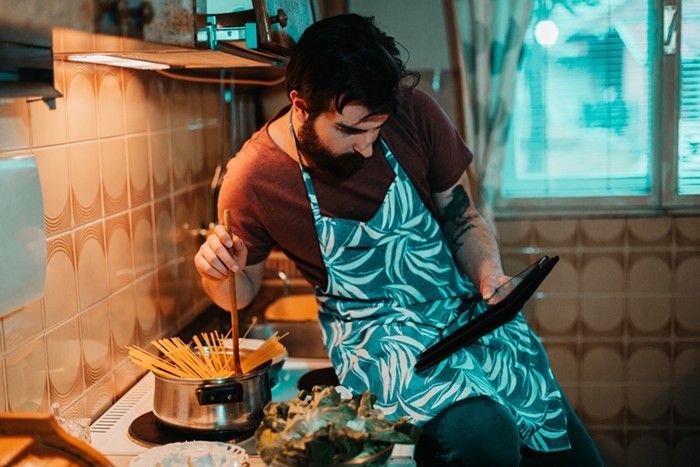 A portrait of the author cooking while stoned. A portrait of the author cooking while stoned.