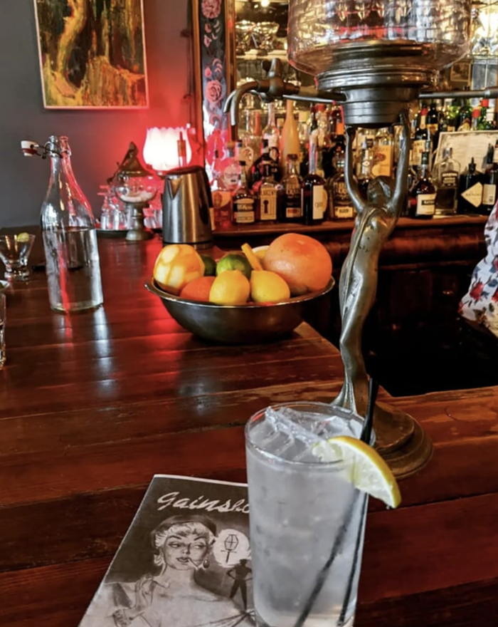 A Microphone Czech (gin, Becherovka, celery shrub, tomic, lime) and the aforementioned lady-shaped absinthe fountain. It’s so pretty. A Microphone Czech (gin, Becherovka, celery shrub, tomic, lime) and the aforementioned lady-shaped absinthe fountain. It’s so pretty.