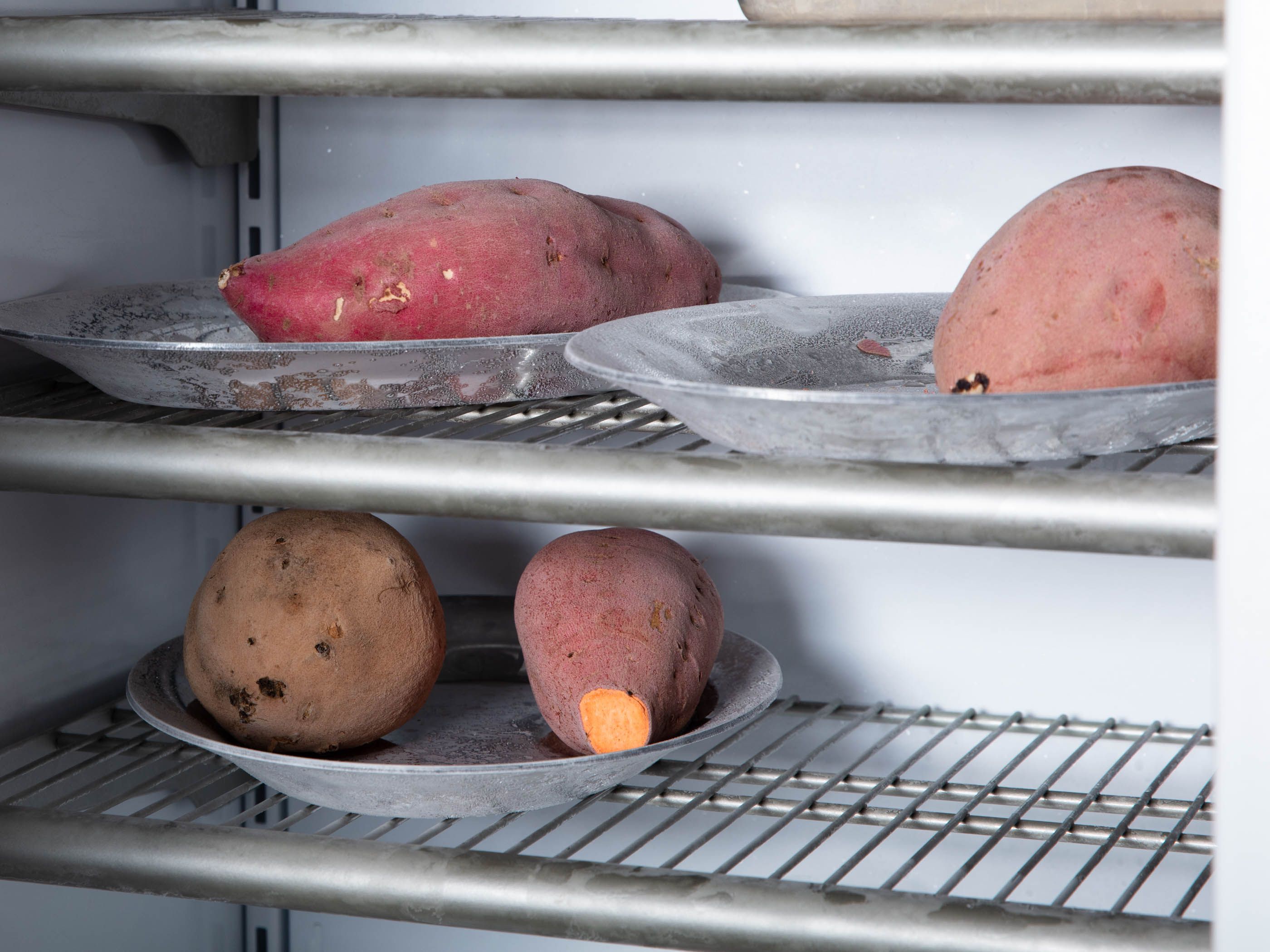 Sweet potatoes on pie. plates in a freezer