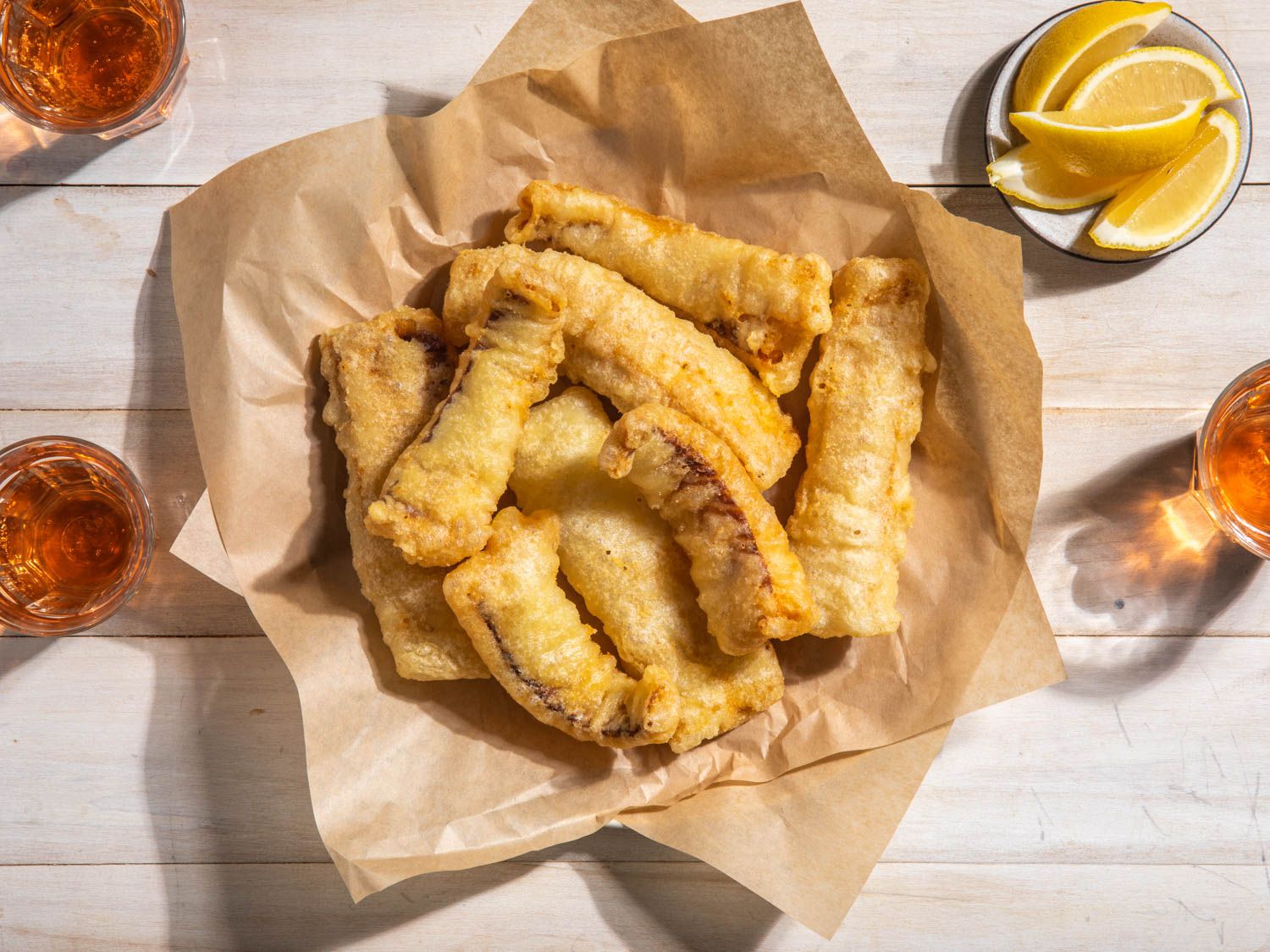 Overhead of a serving platter of fried salt cod fillets