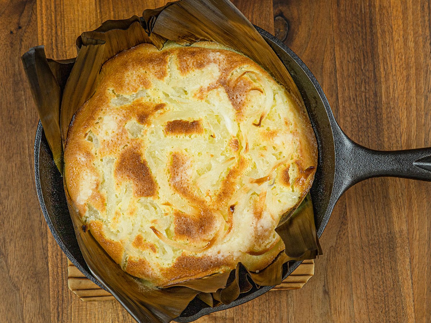 Bibingka after broiling, with a caramelized top