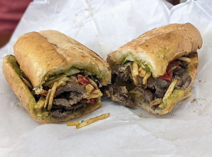 The pan con bistec (palomilla steak sandwich) with shoestring fries inside the sandwich, omg. The pan con bistec (palomilla steak sandwich) with shoestring fries inside the sandwich, omg.