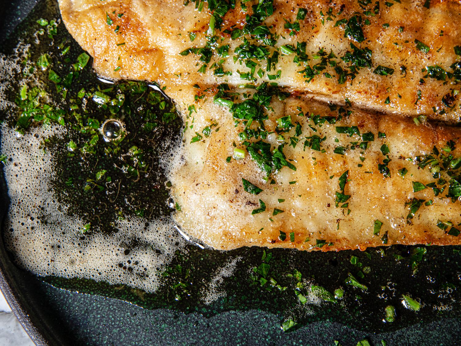 Close up crop of a plated sole meuniere