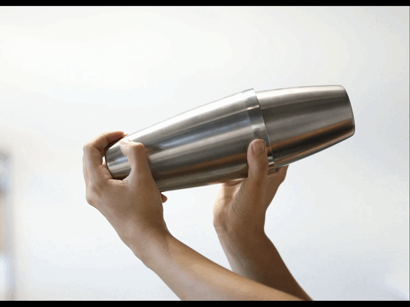 GIF of a Boston shaker being shaken with two hands