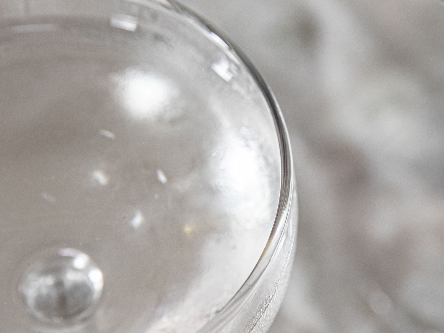 An up close shot of the rim of a coupe glass