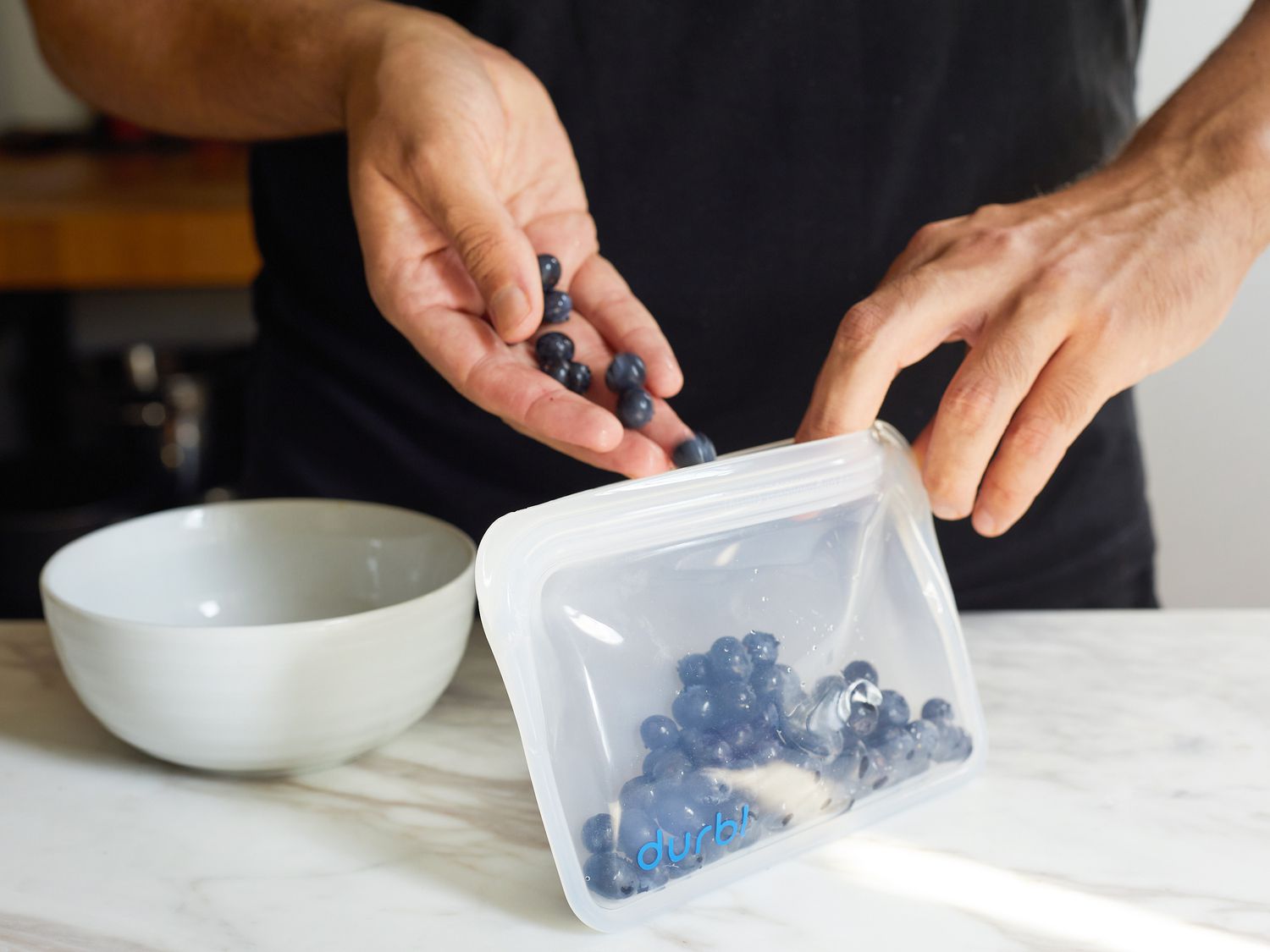 putting blueberries into the durbl bag