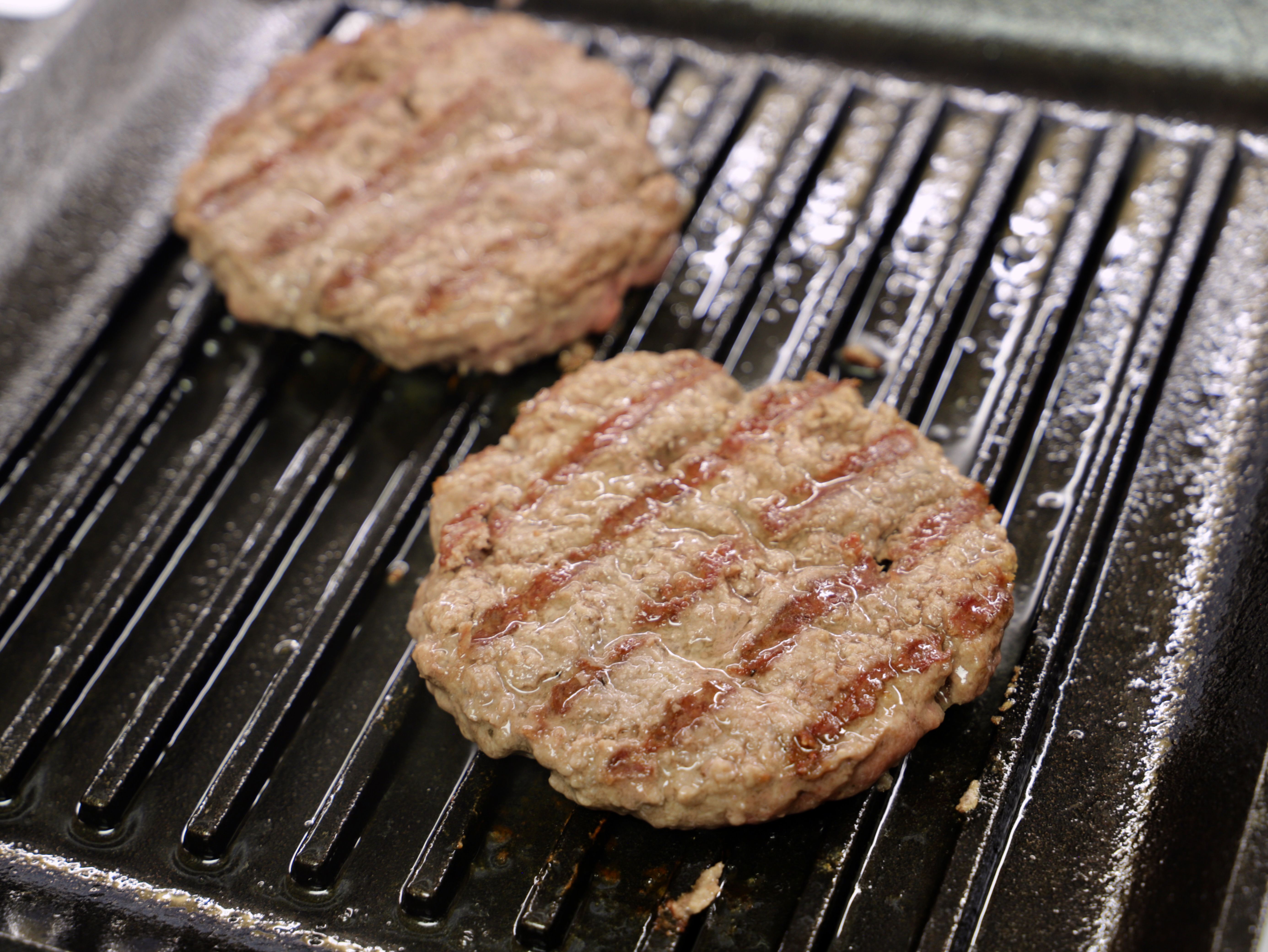 grilling burgers in grill pan