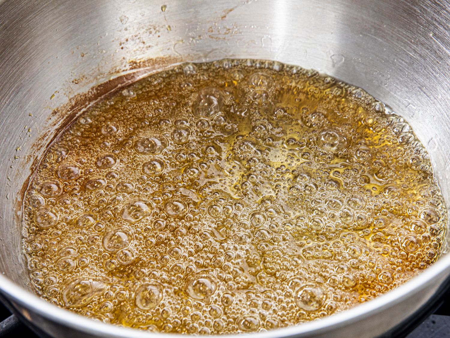 Carmel bubbling in a pan