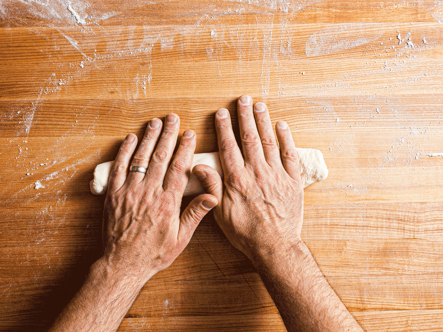 Gif of elongating dough into a cyclinder